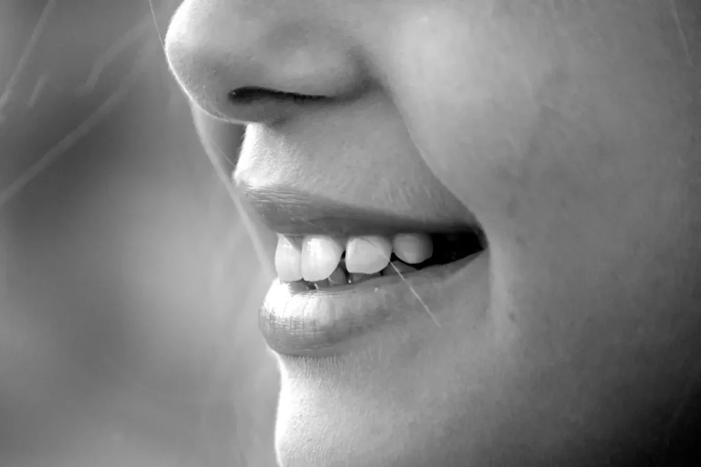 Woman smiling photo in black and white